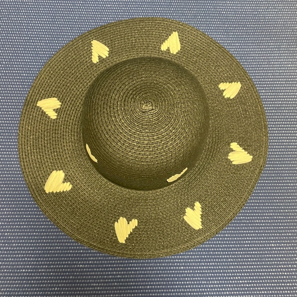 Black straw hat with white hearts